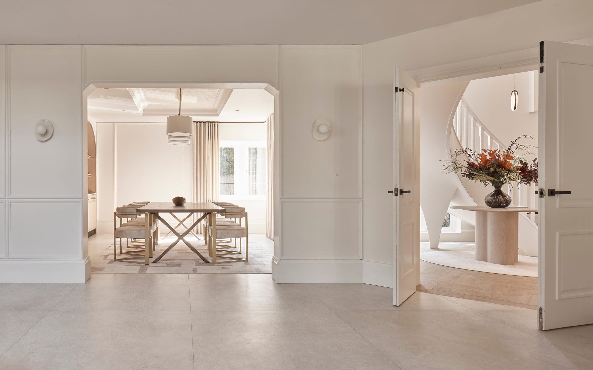 The dining room and hall of a Prestbury family home